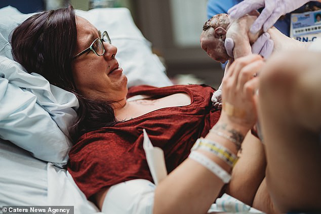 Ms Davis claims she fell in love with her daughter during her pregnancy but 'nothing compared to holding her and seeing her'. The mother saw past Rylei's disabilities and 'was in love'