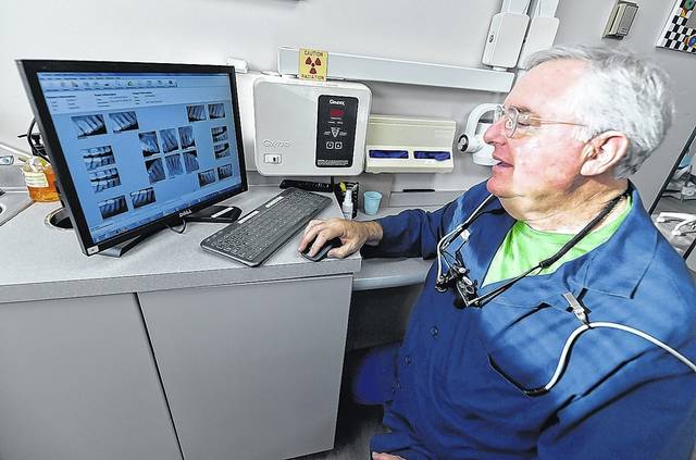 

<p>Dentist Gary Nataupsky looks at x-rays of a patient’s teeth in his Kingston office.</p>
<p>Aimee Dilger | Times Leader</p>
<p>“></a> </p>
<p>Dentist Gary Nataupsky looks at x-rays of a patient’s teeth in his Kingston office.</p>
<p>Aimee Dilger | Times Leader</p>
<p> <a href=