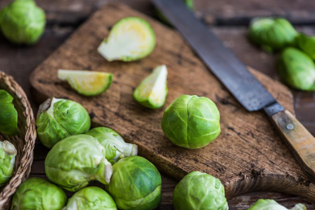 Brussels sprouts on chopping board