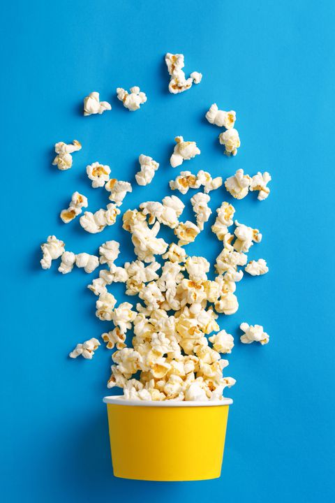 Close-Up Of Popcorn Against Blue Background