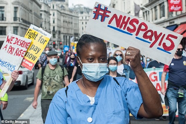 NHS nurses marched through central London in September demanding a 15 per cent pay rise